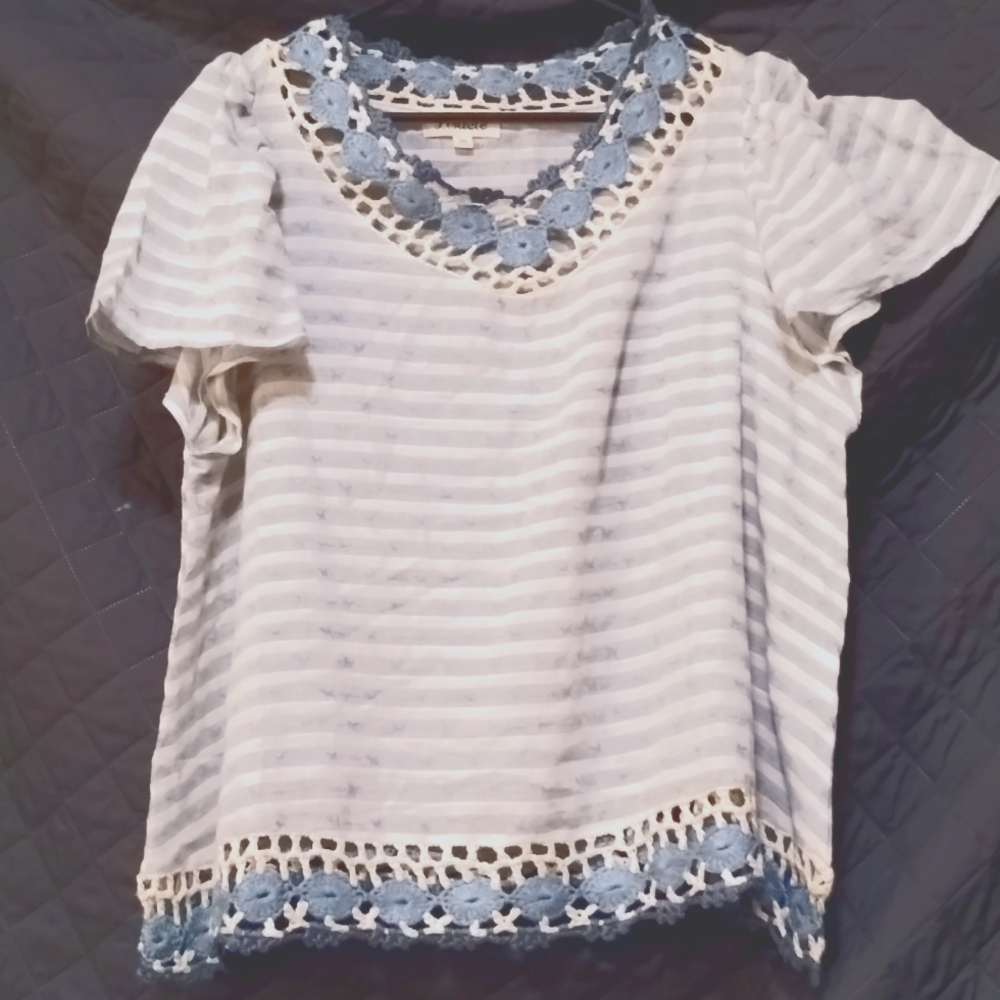 Listicle medium blue and white stripes with some crochet.